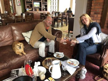 Gina enjoying some refreshments with guests