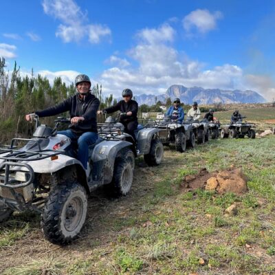 quad bike trails at wine valley adventures a row of guests enjoying their magical experience on quad bikes in the heart of the Franschhoek Wine Valley